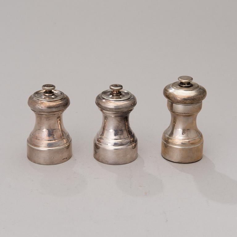 Three Peugeot pepper mills, silver and silver plate, France, latter half of the 20th century.