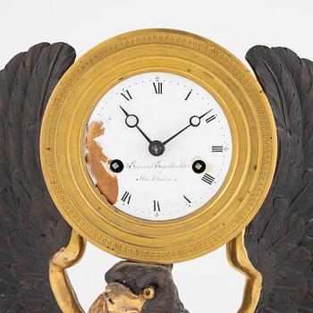 A Swedish Empire giltwood mantel clock by E. Engelbrechten (watchmaker active in Stockholm 1815-45).