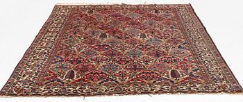 An antique/semi-antique Bakthiari carpet, c 298 x 213 cm.