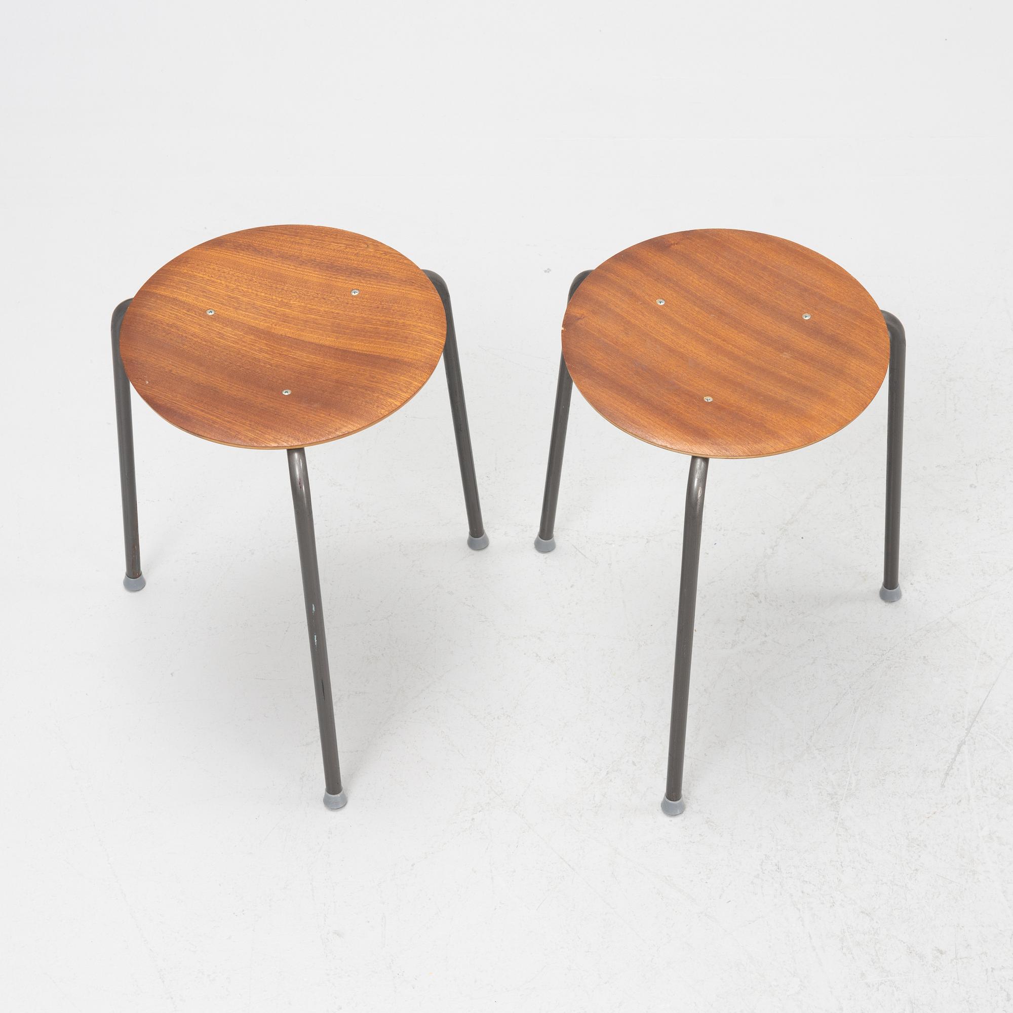 A set of five teak veneered stools, second half of the 20th Century.