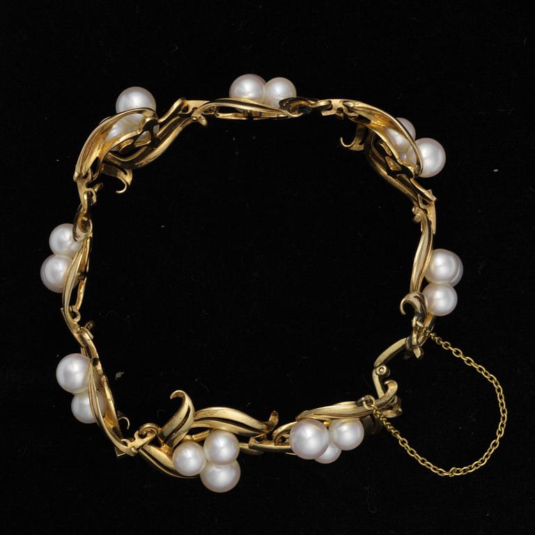 ARMBAND, 14K guld, pärlor. Vikt ca 22,1 g.