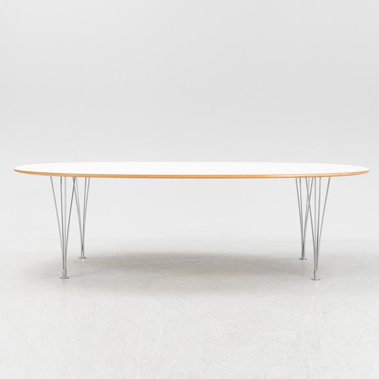 A Super ellpitical dining table, by Bruno Mathsson and Piet Hein for Fritz Hansen dated 2008.