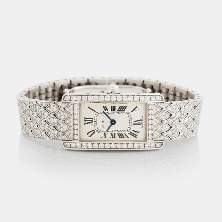 A Cartier "Tank Américane" 18K white gold watch set with round brilliant-cut diamonds.