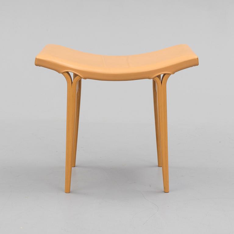 a footstool by BRUNO MATHSSON.