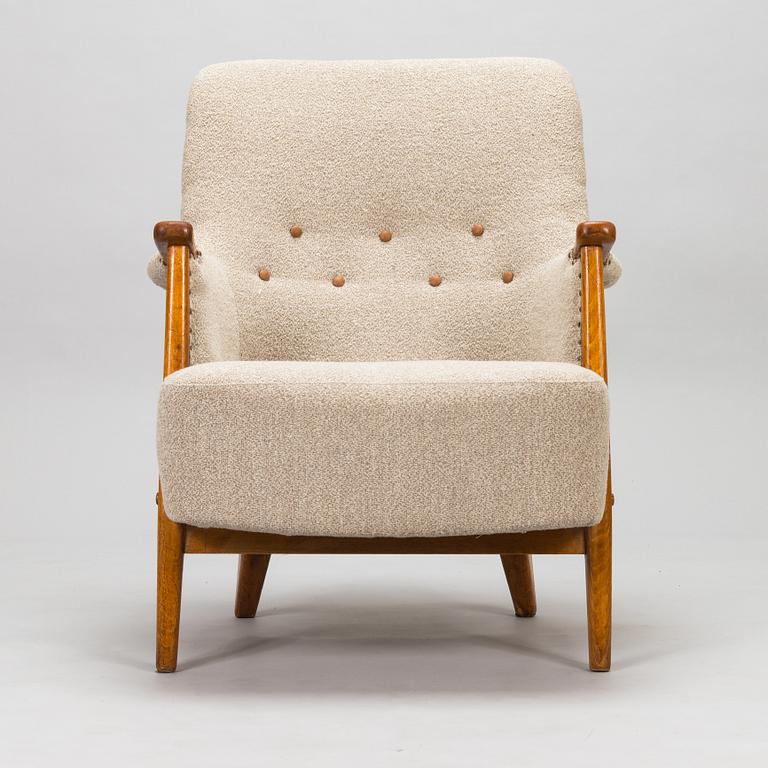 Olof Ottelin, a 1950's 'Pompadour' armchair for Oy Stockmann Ab, Keravan puusepäntehdas.