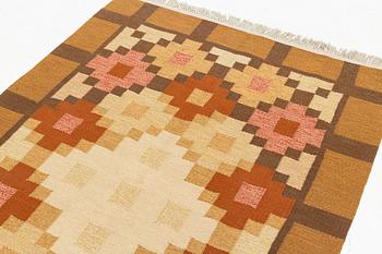 A flat weave carpet, c 210 x 130 cm, signed AMB.