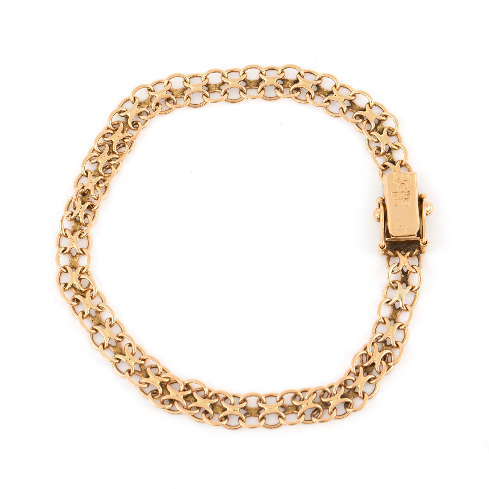 ARMBAND, 'X' länk.