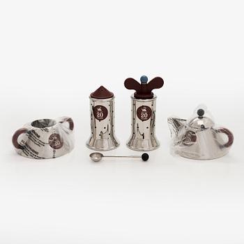 A set of four serving accessories, Alessi, Italy.