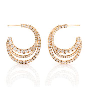 588. A pair of Cartier earrings in 18K gold set with round brilliant-cut diamonds.
