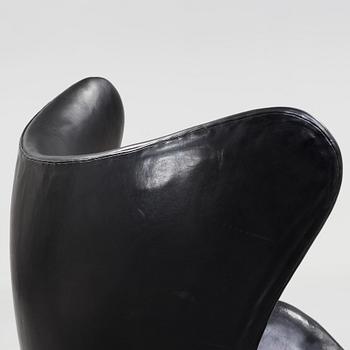 An Arne Jacobsen black leather 'Egg' chair, Fritz Hansen, Denmark 1960's.