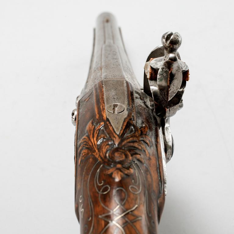 A flintlock gun, probably 18th century.