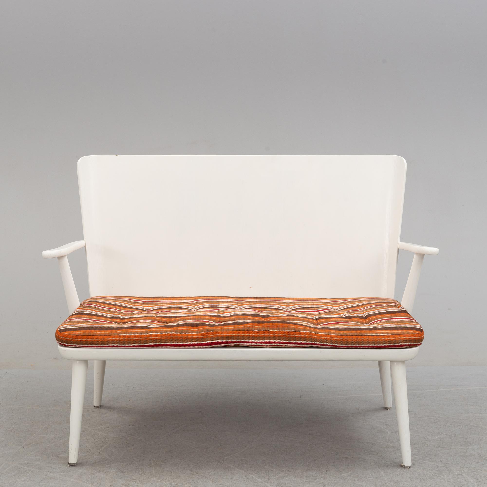 A second half of the 20th century sofa, pair of armchairs and coffee table by Göran Malmvall.