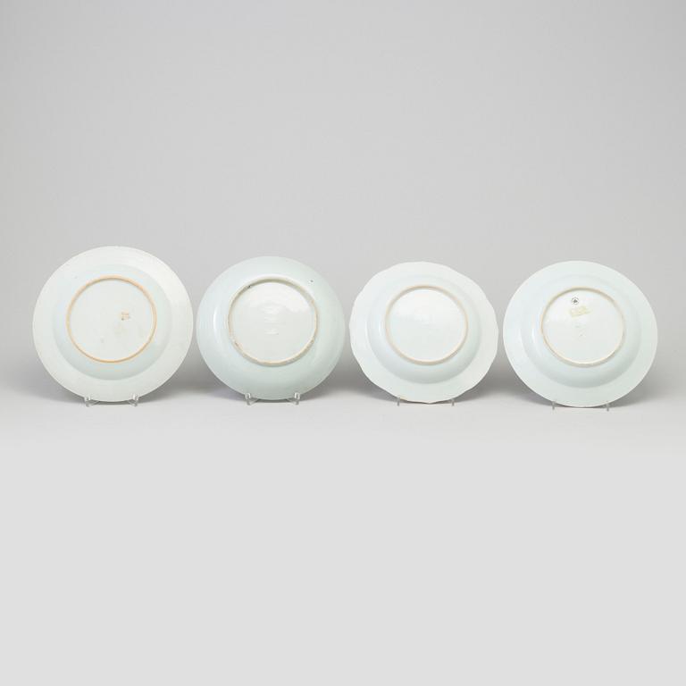 A set of four odd blue and white plates, Qing dynasty, Qianlong (1736-95).