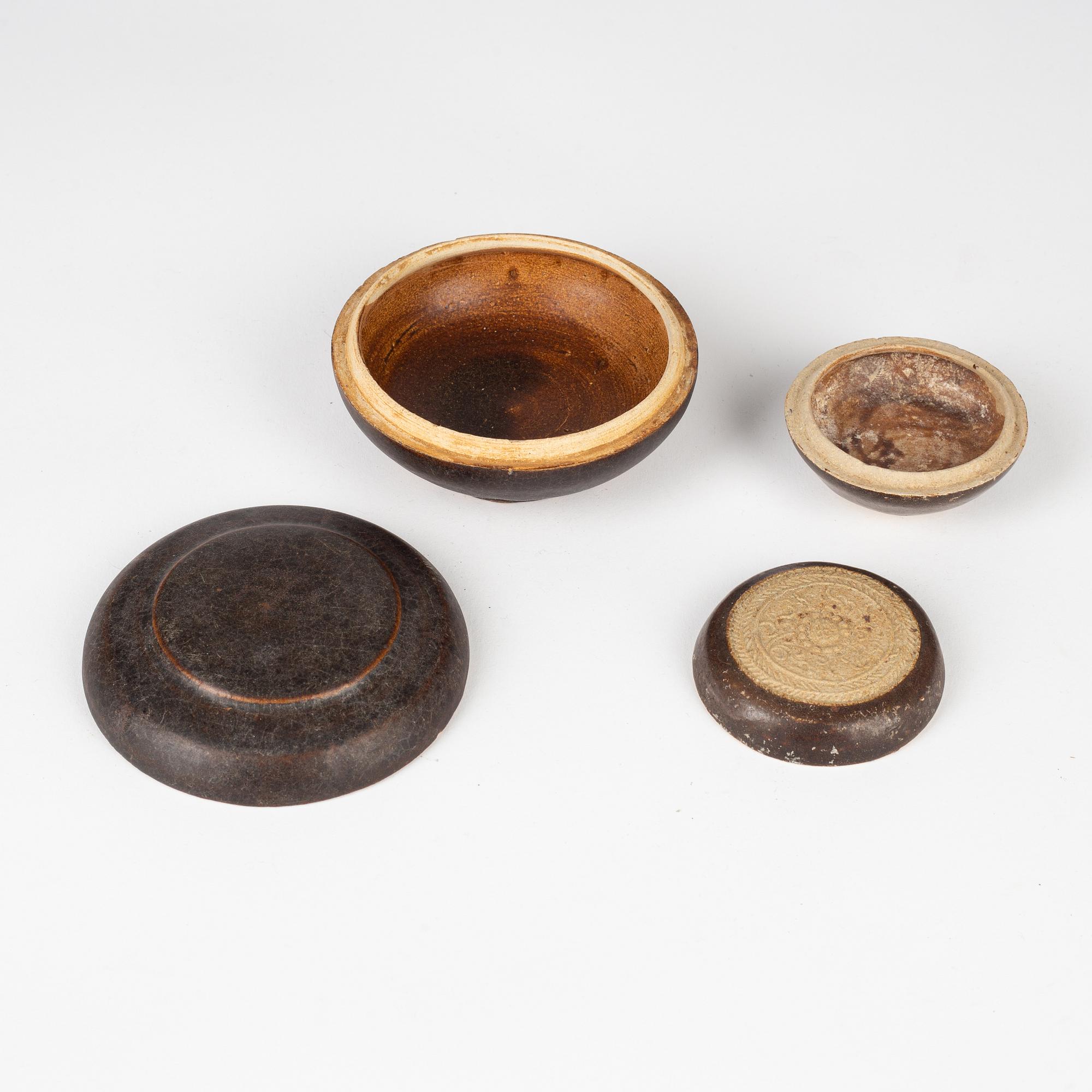 A group of brown glazed South East Asian potteries, 14th/17th Century.