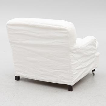 A Howard model armchair, contemporary.