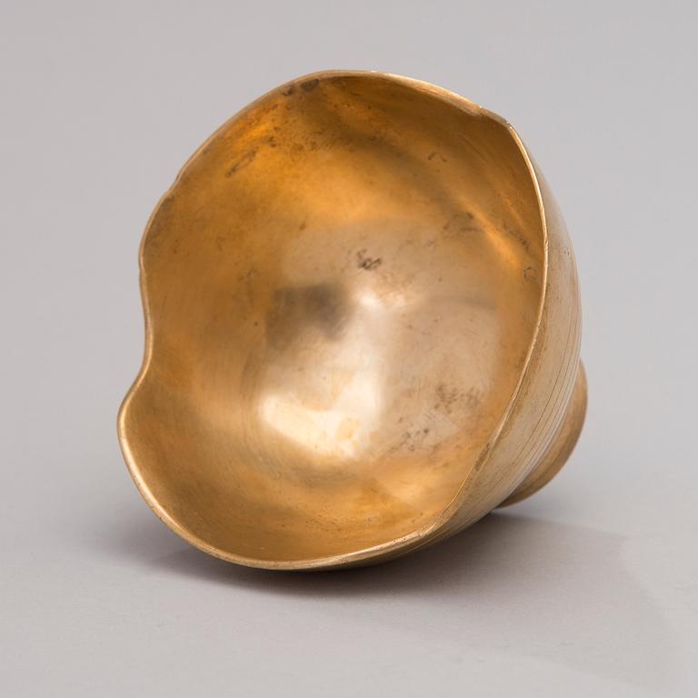 A mid-20th century bronze bowl stamped Oy Taito Ab.