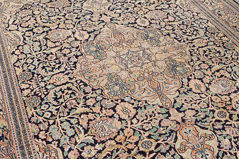 A Kashmir carpet, silk, c. 333 x 234 cm.
