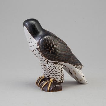 A Lisa Larson stoneware figurine.