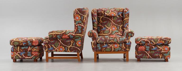 A pair of Svenskt Tenn armchairs with ottomans, model 3543, "Oxford".