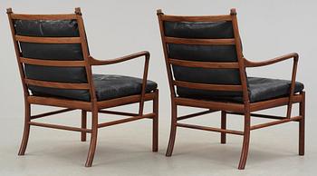 A pair of Ole Wanscher palisander and black leather 'Colonial Chairs, PJ 149', Poul Jeppesen, Denmark.