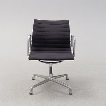An 'Aluminum group arm chair by Charles & Ray Eames, for Vitra.