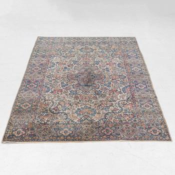 A semi-antique Kerman carpet, c. 273 x 172 cm.