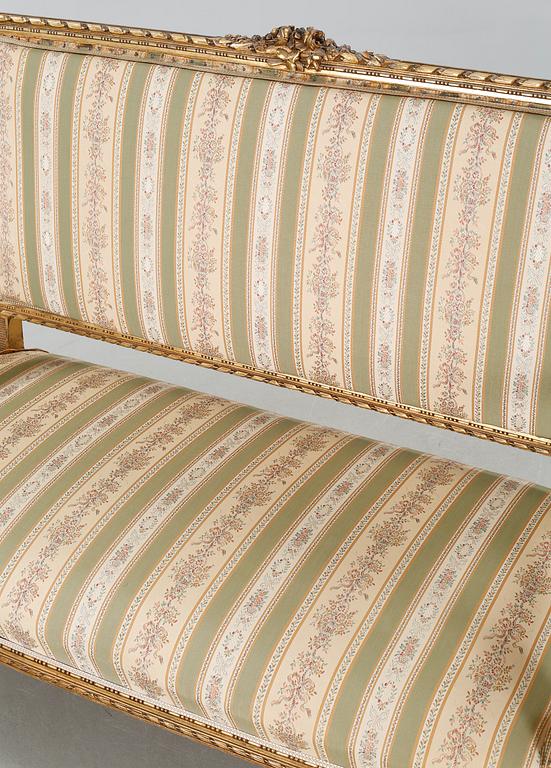 A Louis XVI style sofa from the first half of the 20th century.