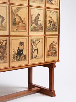 Josef Frank, 'Apskåpet' (The monkey cabinet), a rare cabinet covered with prints of different monkeys, Svenskt Tenn, Sweden ca 1941.