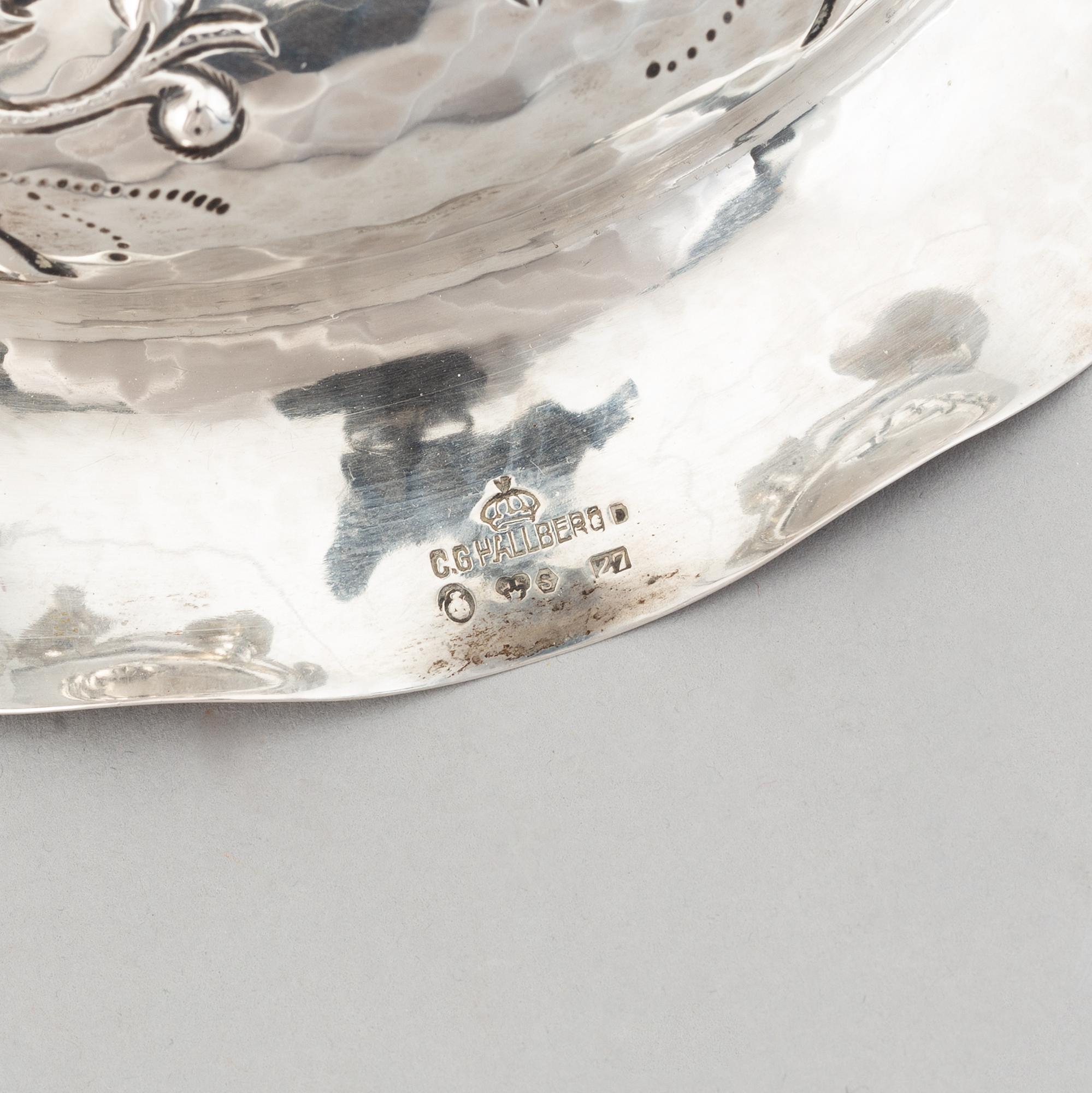 A pair of Swedish baroque-style silver candelabra, mark of CG Hallberg, Stockholm 1926.