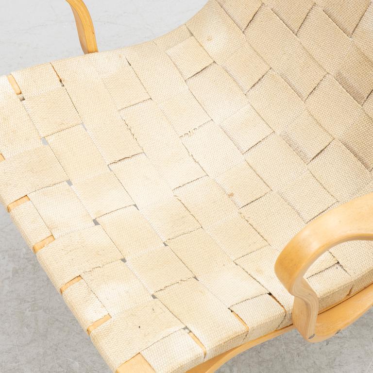 Bruno Mathsson, a pair of 'Eva' armchairs, DUX, Sweden, second half of the 20th century.