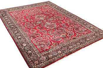 An oriental carpet, c. 360 x 274 cm.