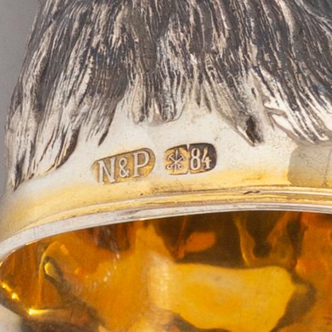 Six Russian parcel-gilt silver animal's head stirrup cups, including with mark of Nikols & Plinke, St. Petersburg.