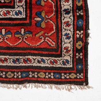 An antique Indian carpet, c 390 x 299 cm.