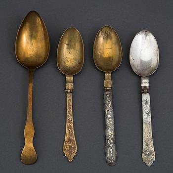 Four 18th century brass and iron spoons.