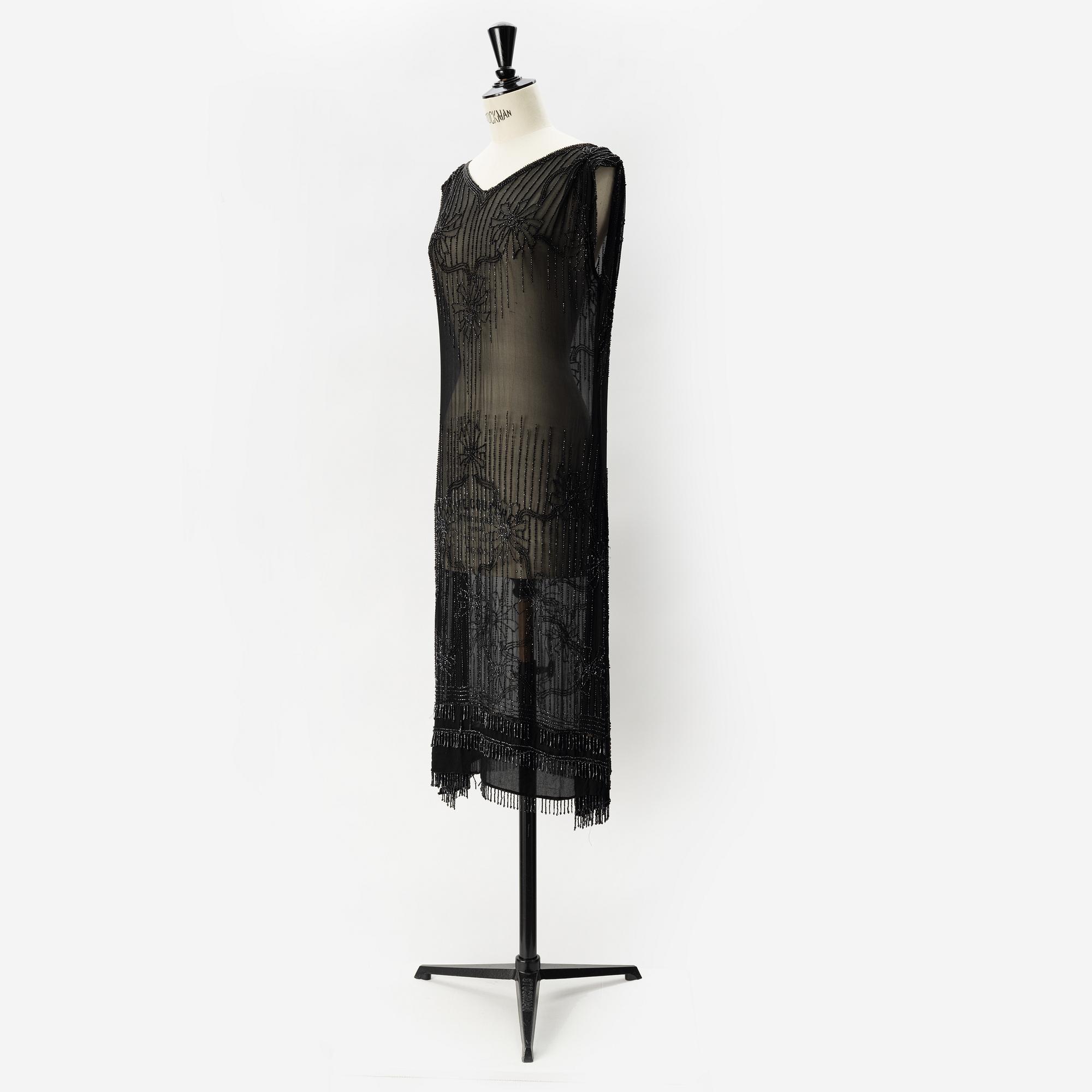 A 1920's pearl embroidered dress.