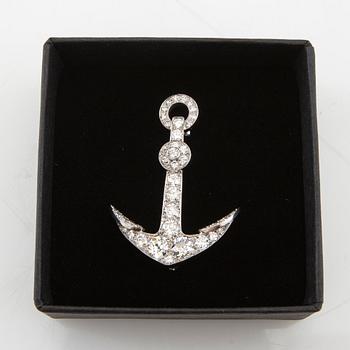 Brooch in the form of an anchor made of 18K white gold with diamonds.