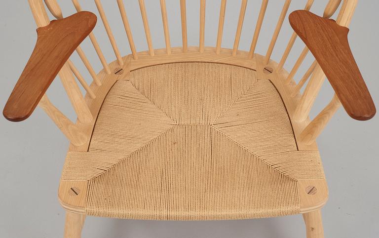 A Hans J Wegner ash and teak 'Peacock chair', by PP Møbler, Denmark.