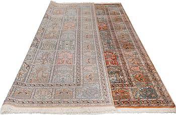 A silk Kashmir carpet, approx. 327 x 243 cm.