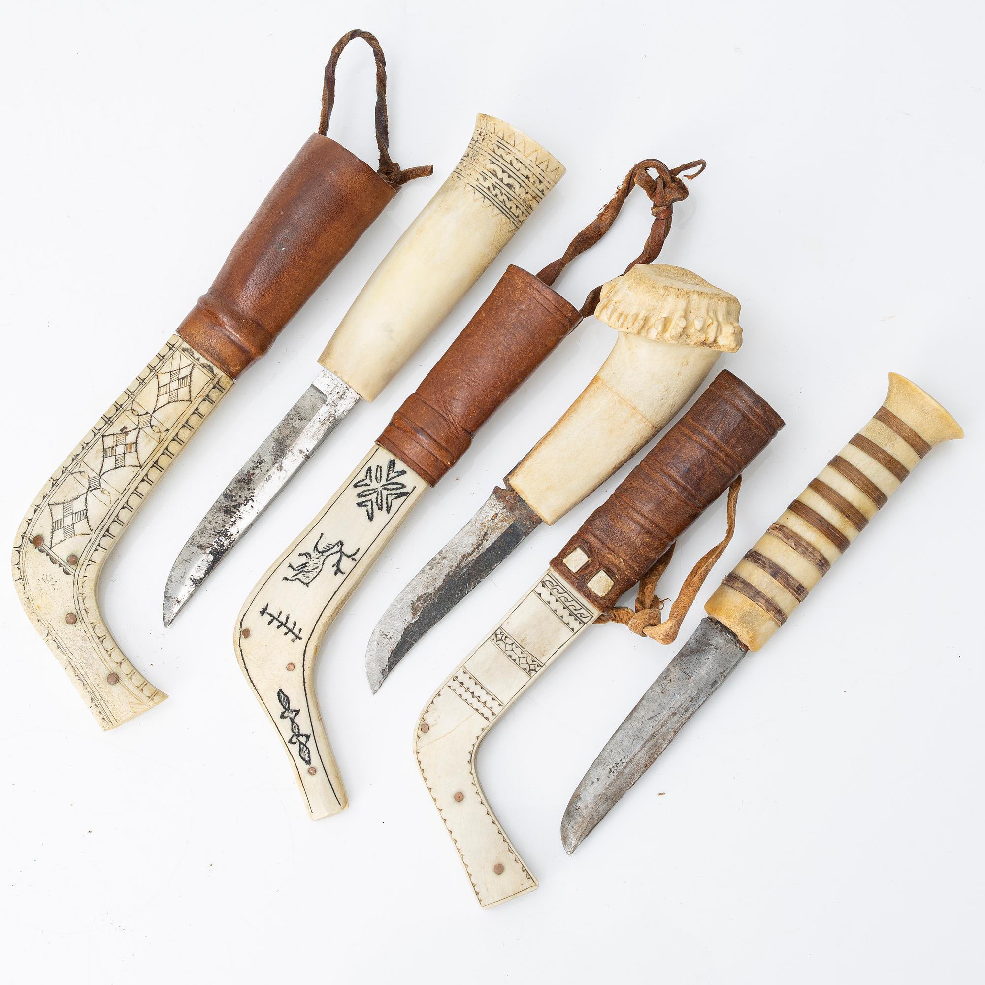 Nine half-horn knives, unidentified craftsman.