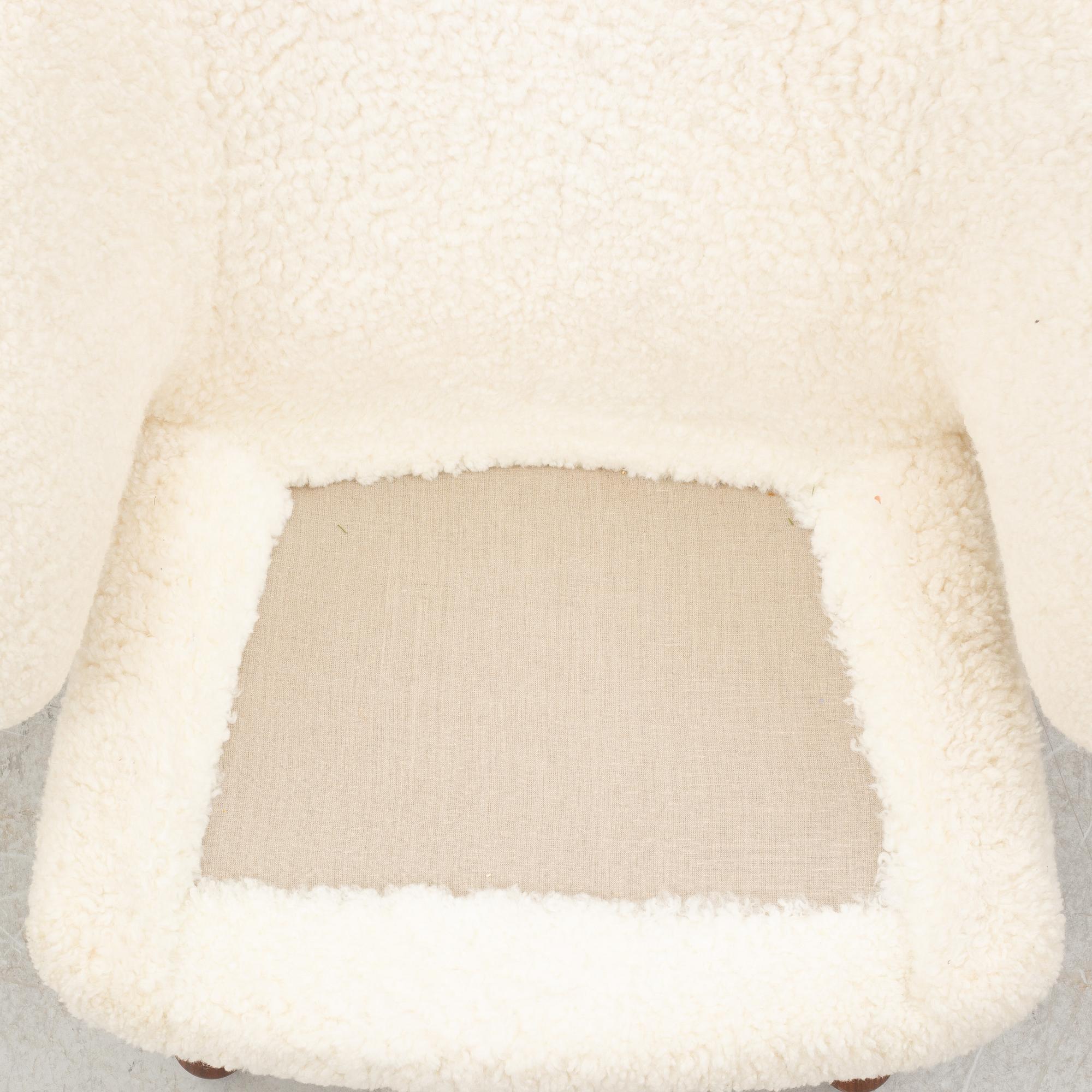 Finn Juhl, a' Pelican Chair' armchair, House of Finn Juhl, Denmark.