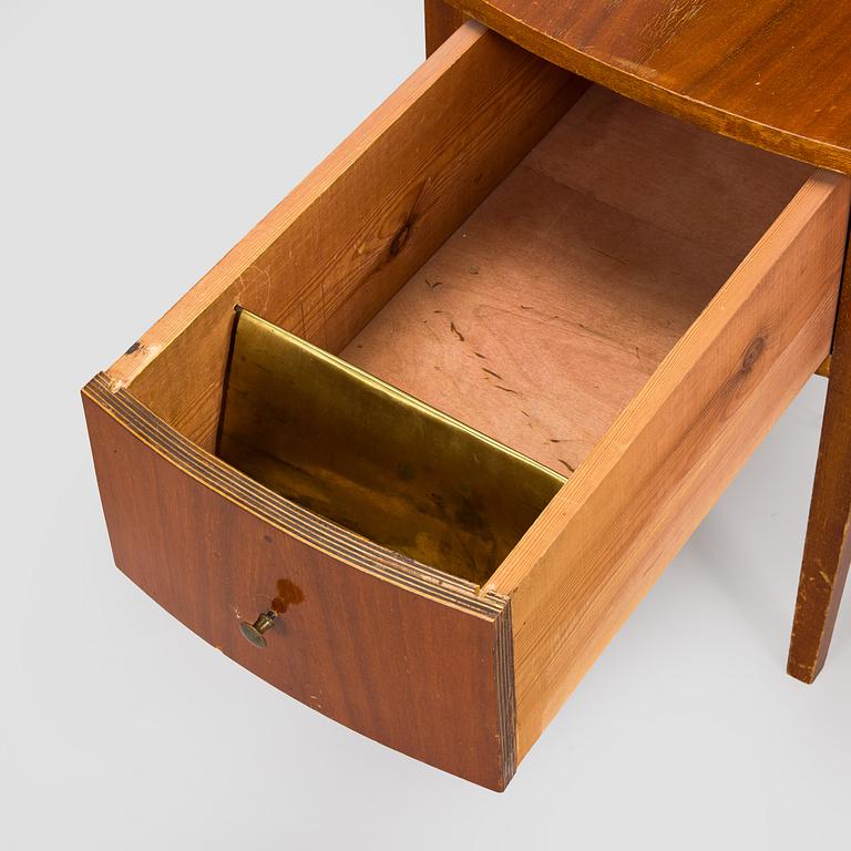 A pair of 20th century bedside tables.