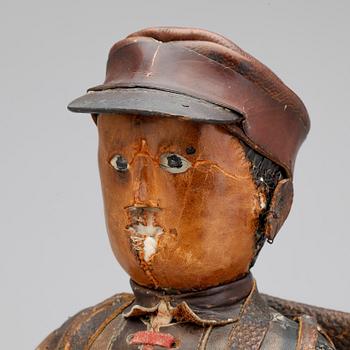 DOCKA, läder, 1800-tal.