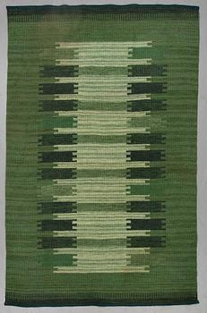 A CARPET, flat weave, ca 239,5 x 153-156 cm, signed ML, Sweden second half of the 20th century.