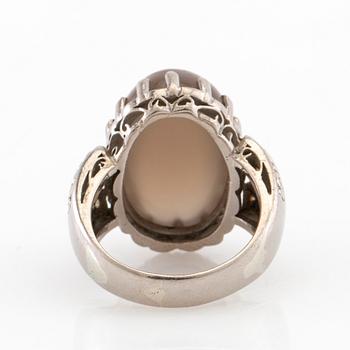 Ring 18K white gold with diamonds and cabochon-cut grey moonstone, Gunnar Fahlström Stockholm 1953.