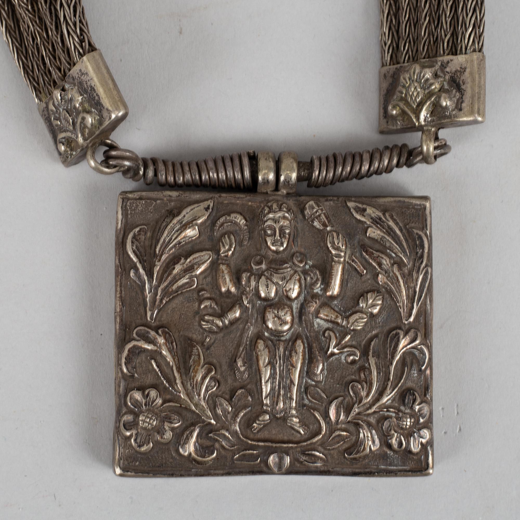 A Tibethan pendant/necklace, circa 1900.