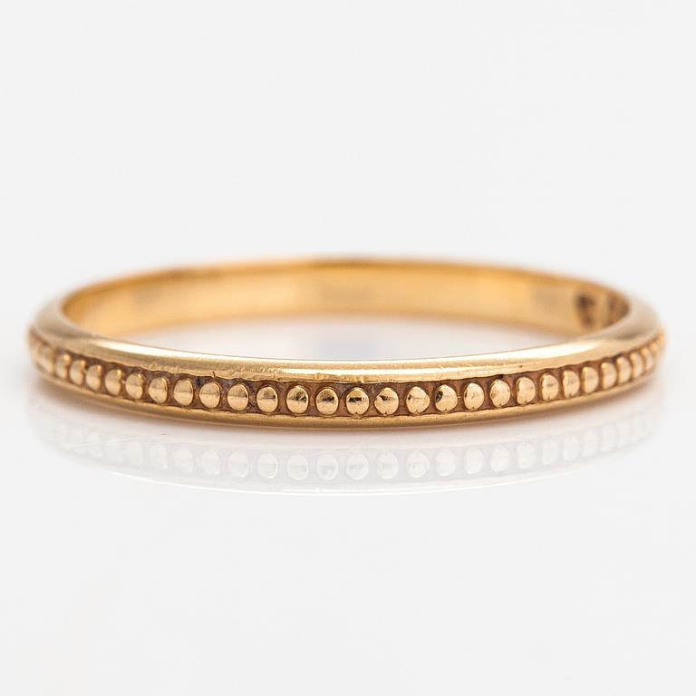 Ring, 18K guld. Kalevala Koru, Helsingfors 1988.