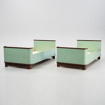 David Blomberg, a pair of macassar veneered beds, AB Svenska Möbelfabrikerna Bodafors, 1930's.