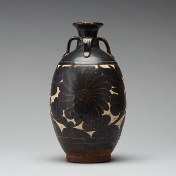 A black-glazed sgraffito vase, presumably Yuan Dynasty.