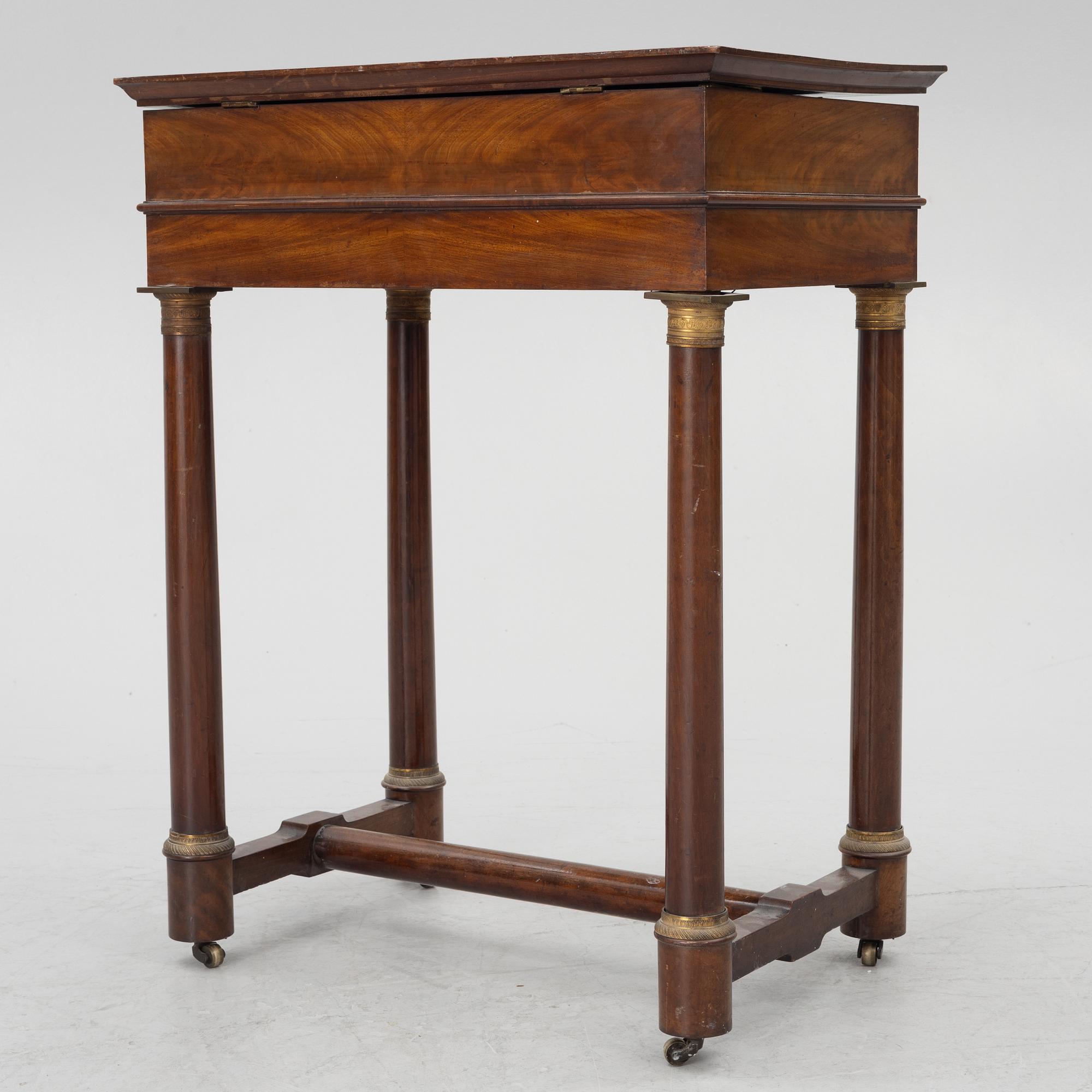 A French Empire mahogany sewing table, first part 19th century.