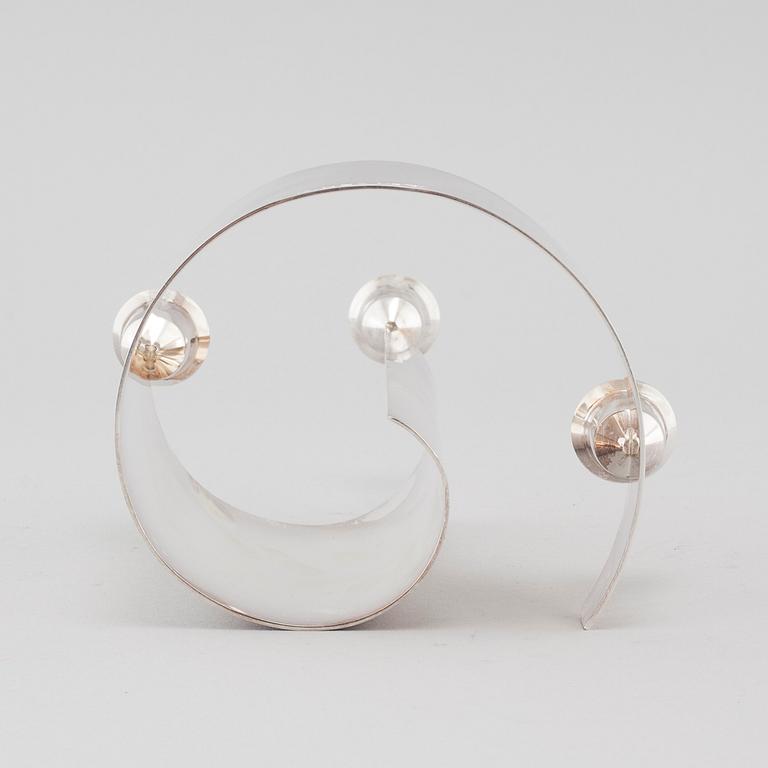 A candle holder in silver, unidentified designer, made by MEMA in linköping 1993. Weight 581 g.